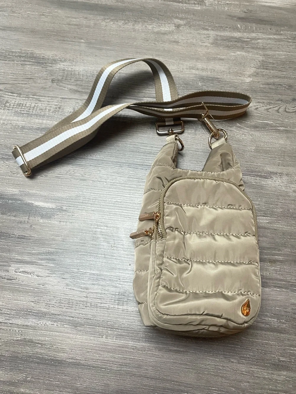 Quilted Light Beige Water Sling Bag with Gold Accent